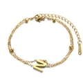 Minimalist double-layered gold stainless steel bracelet with a letter N charm and small beads - Letter N