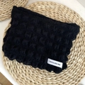 Portable black bubble texture makeup bag with elastic puckered fabric and decorative label - Bubble Storage Bag - Black