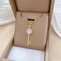 Macro view of gold key pendant necklace with zircon crystals in a jewelry gift box - Gold Key Style (J501)