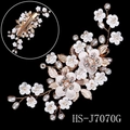 Bridal hair comb with white 3D flowers, pearls, and gold leaves on a black background - Gold Five-Petal Flower Artificial Pearl Hair Clip (HS-J7070G)