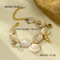 Detail of beach style shell bracelet with pearl and seahorse pendant on sand background - White Seahorse Bracelet