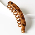 Minimalist vertical banana hair clip featuring a classic dark brown tortoiseshell resin finish - Coffee Amber