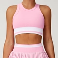 Completo sportivo rosa a coste con top yoga e gonna a pieghe con doppie strisce bianche - S / Rosa Chiaro