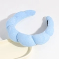 Cloud padded headband in light blue plush fabric, perfect for daily face washing and chic styling. - Blue