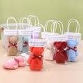 Blue coral fleece towel folded into a bear shape with a red bow and pearl detail - 30*30cm / Solid Pearl Bear with Bag