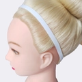 White elastic silicone yoga sports headband shown on a female mannequin head - White