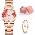Detail of rose gold watch with red feather dial, sparkling star bracelet, and gift box - Red + Bracelet + Box