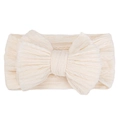 Creamy white baby headband featuring a large cable knit bow on elastic nylon fabric - Sand