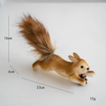 Lifelike 23cm plush squirrel Christmas tree ornament holding a pinecone - Lying Pose Squirrel Figurines