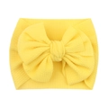 Soft elastic yellow baby headband featuring a large waffle texture double bow design - Yellow