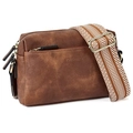 Detail view of brown leather crossbody bag with striped strap and gold metal hardware - Dark Brown