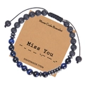 Dettaglio del bracciale codice Morse con perle occhio di tigre blu e pietre laviche - Bracciale Codice Morse Miss You (Occhio di Tigre Blu)