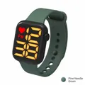 Detail view of pine green silicone strap and LED digital time display on square watch - Pine Green (Yellow LED)