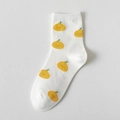 White cotton crew socks featuring cute yellow citrus fruit patterns with minimal faces - White Orange