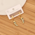 Detailed shot of gold stainless steel horn earrings with blue ethnic enamel patterns - 6# Crescent Horn Ethnic Painted Pattern