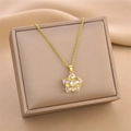Elegant gold titanium steel necklace featuring a flower pendant with zircon petals - Gold White Zircon