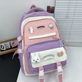 Roze en paarse patchwork schoolrugzak met astronautspelden en een konijnenpop - Geen Hanger / Paars