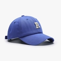 Royal blue baseball cap featuring a white embroidered letter R and adjustable back strap - Sky Blue
