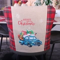 Weihnachtliche Stuhlhusse mit blauem Truck, Gnomen und rotem Merry Christmas Schriftzug - LKW Seitenansicht