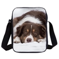 Crossbody bag featuring a 3D Australian Shepherd puppy print on a snowy background - Aussie in Snow