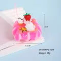 Mini strawberry cream cake keychain in pink finish with pearl and star details - Purple Cream Strawberry Cake - Strawberry Style / Pink Phone Cord Style
