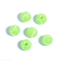 Macro detail of tennis ball acrylic beads in neon green and white for DIY jewelry making - Green+White Tennis