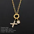 Collana a catena in acciaio inox con croce di perle e ciondolo in cristallo dorato - Lettera X