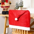 Detail of red Santa hat chair cover made of soft non-woven fabric for Christmas table decor - Non-woven Fabric Chair Cover
