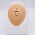 Silver stainless steel belly button ring featuring a floral design with clear cubic zirconia - Six-Petal Zirconia Flower