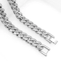 Macro shot of silver stainless steel Cuban link bracelet with a fold-over clasp detail - Necklace 45cm / 10mm Width