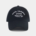 Close-up of white letter embroidery on a black cotton twill vintage baseball cap - Adjustable / Black