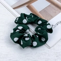 Chic dark green hair scrunchie with large white polka dots on a minimalist background - Dark Green