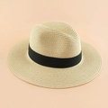 Classic beige woven straw Panama hat with a contrasting black ribbon band for summer beach - Beige