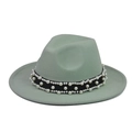 Detailed close-up of light green wool fedora hat featuring elegant pearl-studded black band - Fruit Green Fedora with Pearl Chain