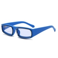 Modern blue plastic sunglasses with a metallic inner frame shown at a 45-degree angle - Blue Frame / Blue Lens