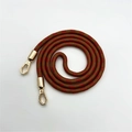 Macro detail of brown and red woven bag strap with gold metal swivel hook clasp - Long Style / Brown