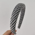 Detail of vintage houndstooth headband with sequins held against white wall - 3CM Width