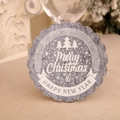 Detailed close-up of light gray felt Christmas coaster with white printed tree and greetings - Christmas Tree / Gray