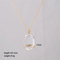 Detailed view of the 18K gold Star Tarot pendant with dimensions 3.5cm and 45cm chain - The Star Style
