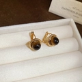 Macro shot of 18k gold plated tiger eye stone earrings in a beige velvet jewelry box - 30# Retro Gold Plated Gemstone Hoop Earrings