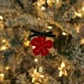 Red felt snowflake ornament with gold embroidery, green velvet bow, and metal bell - Style 11 (Red Snowflake Pendant)