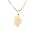 Close-up of golden necklace with silhouette pendant of mother embracing a child - Gold Parent Child Silhouette Style