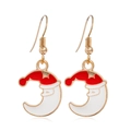 Detail of Christmas earrings featuring red Santa Claus on a white crescent moon charm - Moon #38
