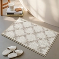Modern minimalist cream chenille bath mat with geometric waffle texture and matching slippers - Twill Elegance