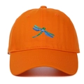 Detailed embroidery of a blue dragonfly on a bright orange cotton baseball cap - Orange