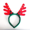 Detail of Christmas reindeer headband with red antlers, gold bells and holly berries - Red Cloth Antlers with Small Bells