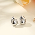 Macro shot of silver teardrop stud earrings with a polished mirror finish surface - Water Drop (Silver)