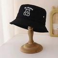 Detailed view of the black cotton bucket hat with white bear embroidery and 'Hi' text - 50-52CM / Black