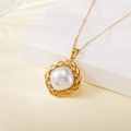 Gold stainless steel necklace featuring a round pendant with a white pearl and braided frame - Woven Texture Round Pearl Style (137614)