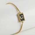 Adjustable gold-plated stainless steel bracelet with letter G shell pendant detail - G-Black